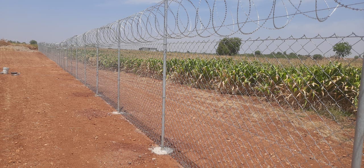 8 Feet Monkey Proof Chain Link Fence with Concertina Coil for Residential Protection